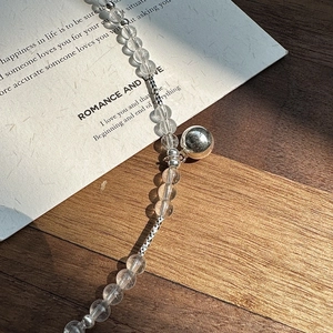 Minimalist S925 silver beaded necklace with clear crystals and a silver ball pendant