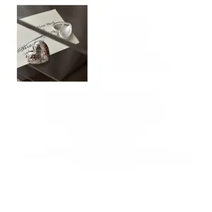 Detail view of heart-shaped S925 sterling silver earrings with hammer texture and dimensions