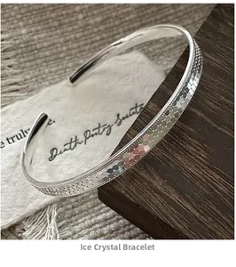 Detailed macro view of 925 silver bracelet featuring a unique cracked ice geometric texture