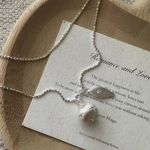 S925 sterling silver ball necklace with brushed metal sphere and zircon leaf pendant
