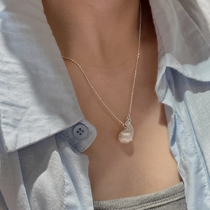 Minimalist S925 sterling silver leaf and glass ball pendant necklace worn on model