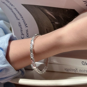 S925 sterling silver minimalist geometric bangle with pavé zircons worn on wrist