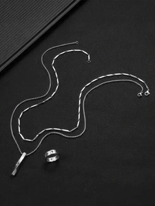 Detailed set of silver stainless steel necklaces and cross engraved ring for men