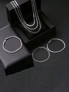 Detail view of 6-piece silver stainless steel jewelry set with rope and cuban chains