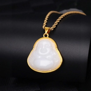 Laughing Buddha necklace with white jade pendant and gold-plated frame on black display