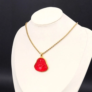 Lucky laughing Buddha pendant necklace with red translucent stone and golden rope chain
