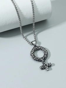 Close-up of vintage Viking Venus pendant with molten lava texture on a steel bead chain