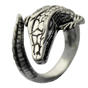 Macro shot of vintage silver crocodile ring showing 3D scale details and punk style