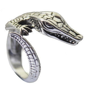 Detail view of vintage silver crocodile ring showing scale texture and adjustable band