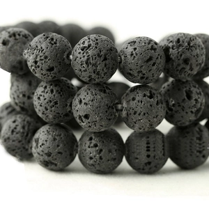 Natural matte black lava rock stone bracelet featuring porous volcanic beads texture