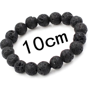 Detailed view of porous black lava stone beads on an elastic bracelet strand