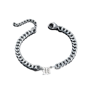Silver stainless steel Cuban chain bracelet with Gothic number 11 pendant and lobster clasp