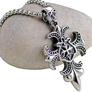 Gothic silver cross necklace with skull bail and intricate floral engraving details
