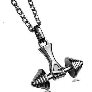 Close-up of gym necklace with hand holding dumbbell pendant in dark silver steel