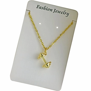 Polished 18K gold-plated dumbbell pendant necklace on jewelry card for fitness women