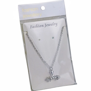 Silver dumbbell pendant necklace for fitness enthusiasts with dainty curb chain