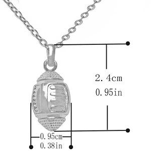 Macro detail of silver American football pendant with dimensions 2.4cm by 0.95cm