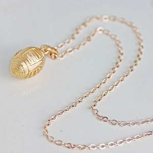 3D American football pendant necklace in golden finish with thin O-chain link