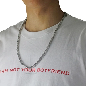 Men's 55cm silver stainless steel dragon bone chain necklace shown on a male model