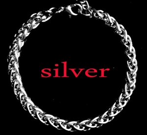 Detailed close-up of a silver wheat chain necklace with a sturdy lobster clasp