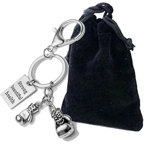 Silver metal boxing glove keychain with engraved metal tag and velvet gift bag