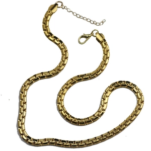 Close-up of gold stainless steel snake chain showing lobster clasp and extender link