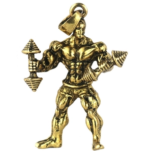 Detailed close-up of antique gold fitness pendant depicting a muscular male lifting dumbbells