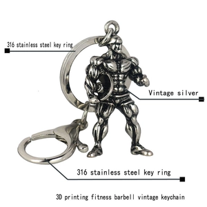 Detail view of 316 stainless steel muscular man keychain with barbell and lobster clasp