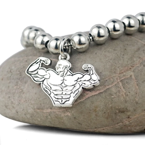 Bracelet à perles en acier argenté réglable avec pendentif homme musclé sur galet