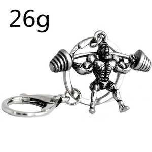 Detailed macro view of antique silver dumbbell fitness keychain weighing 26g