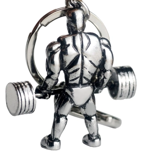Polished metal keychain featuring a muscular weightlifter with a heavy barbell