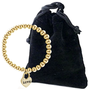 Golden bead bracelet with heart pendant engraved with LOVE and black velvet pouch