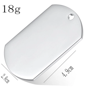 Detail view of a 4.9cm silver stainless steel military dog tag with size and weight info