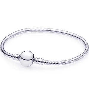 Close-up of a silver stainless steel snake chain bracelet with a classic ball clasp