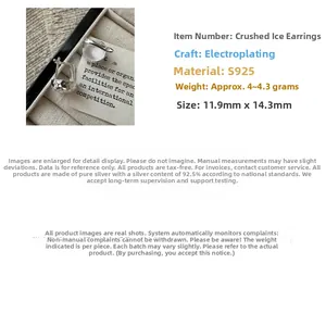 Detail view of 925 silver earrings showing ice-crushed texture and precise dimensions