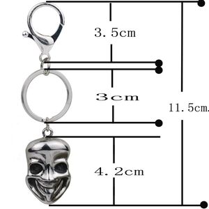Gothic comedy face mask keychain in polished stainless steel 11.5cm total length