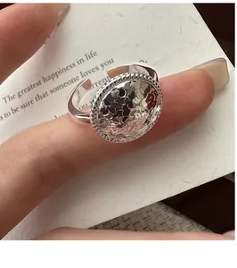 Macro detail of S925 sterling silver ring featuring a unique crushed ice texture finish