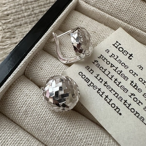 925 Sterling silver hoop earrings with geometric faceted texture in a velvet jewelry box