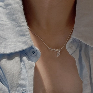 Elegant S925 sterling silver snake chain necklace with zircon teardrop pendant on neck