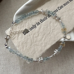 S925 sterling silver beaded bracelet featuring blue faceted gems and adjustable clasp
