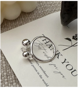 Macro view of S925 sterling silver beaded open ring with mirror polished spheres