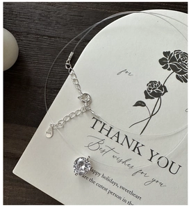 Close-up of S925 sterling silver mermaid tear necklace with brilliant zircon and lobster clasp