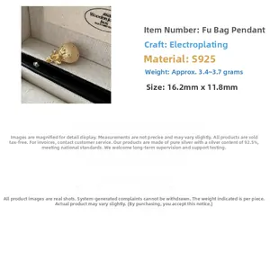 Macro shot of gold S925 sterling silver lucky bag pendant with dimensions and weight specs