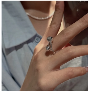 Minimalist S925 sterling silver beaded ring shown on index finger for a stylish fit