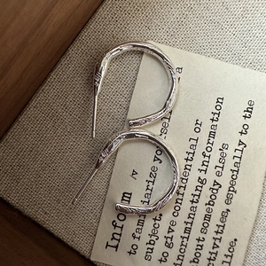 Minimalist S925 sterling silver hoop earrings with irregular lava texture finish
