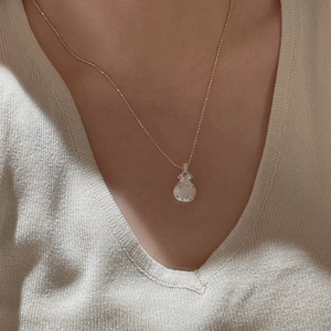 S925 sterling silver retro lucky bag pendant necklace shown on a model neck