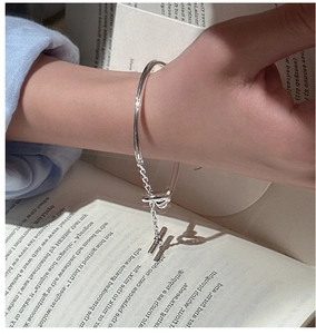 Close-up of S925 sterling silver OT bracelet with half-round ring and soft chain detail