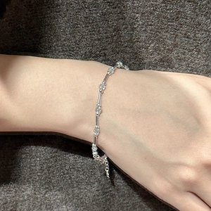 Elegant S925 sterling silver bracelet with aquamarine crystals and beaded chain on wrist