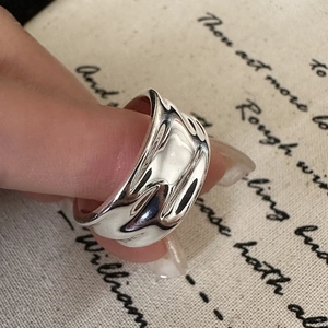 S925 sterling silver liquid metal ring with irregular molten lava texture on hand