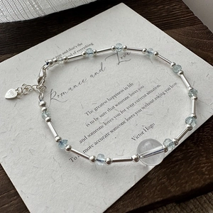 Elegant S925 sterling silver beaded bracelet with light blue aquamarine stones and heart tag